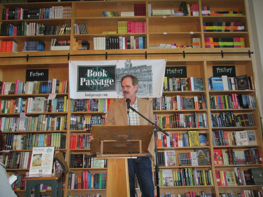 Mark W with bookshelves
