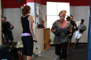 Karen teaching a kickboxing class.