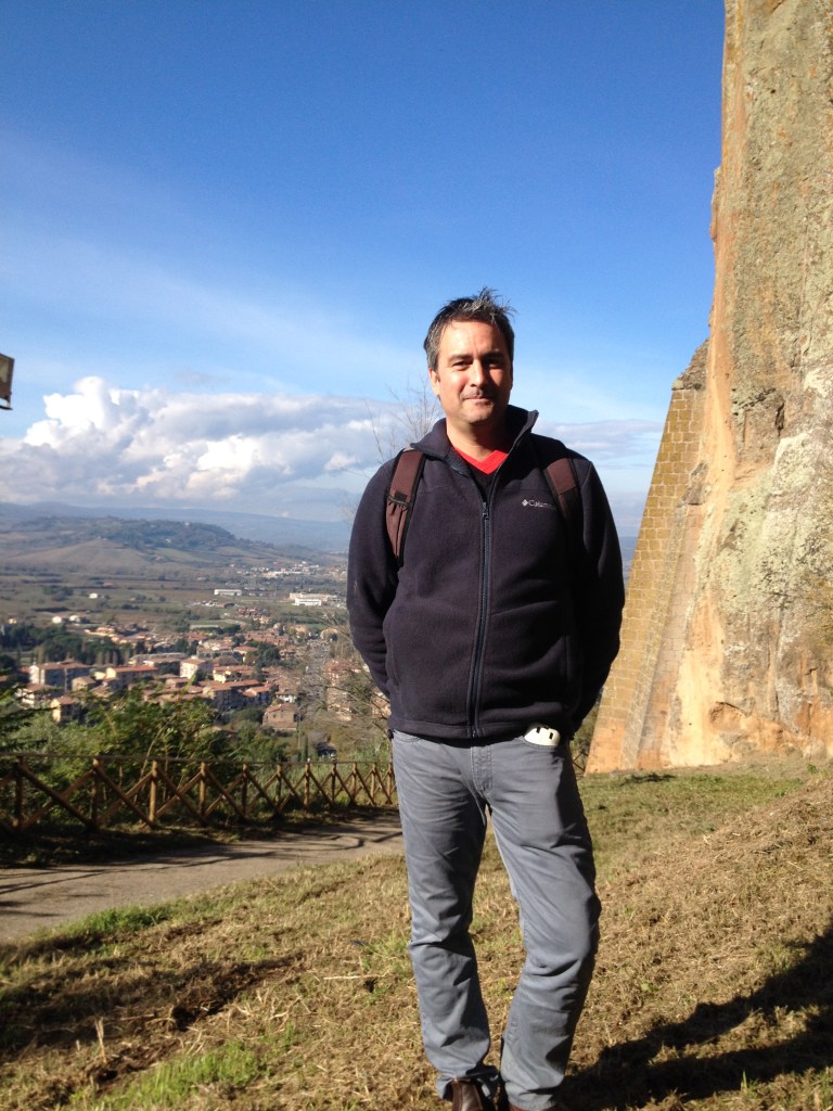 Orvieto - Justen with backdrop of cliff